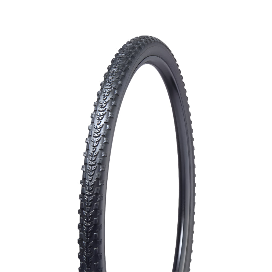 Black bicycle tire with tread pattern on a light gray background