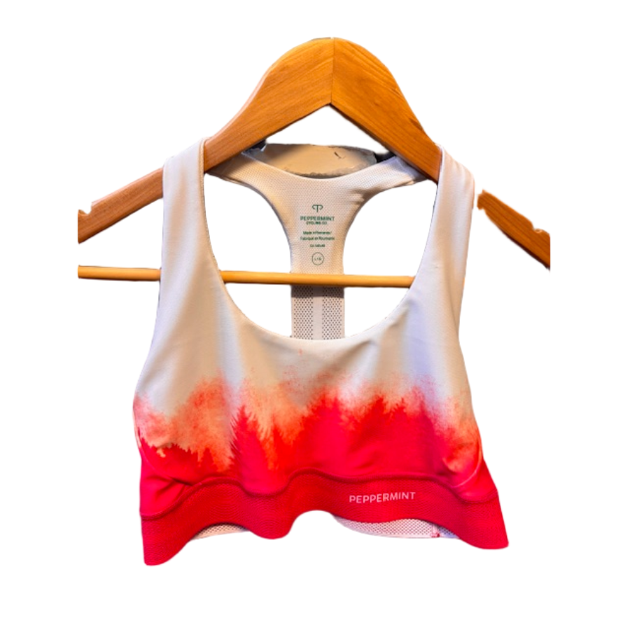 White and red gradient sports bra on a hanger with 'Peppermint' branding.