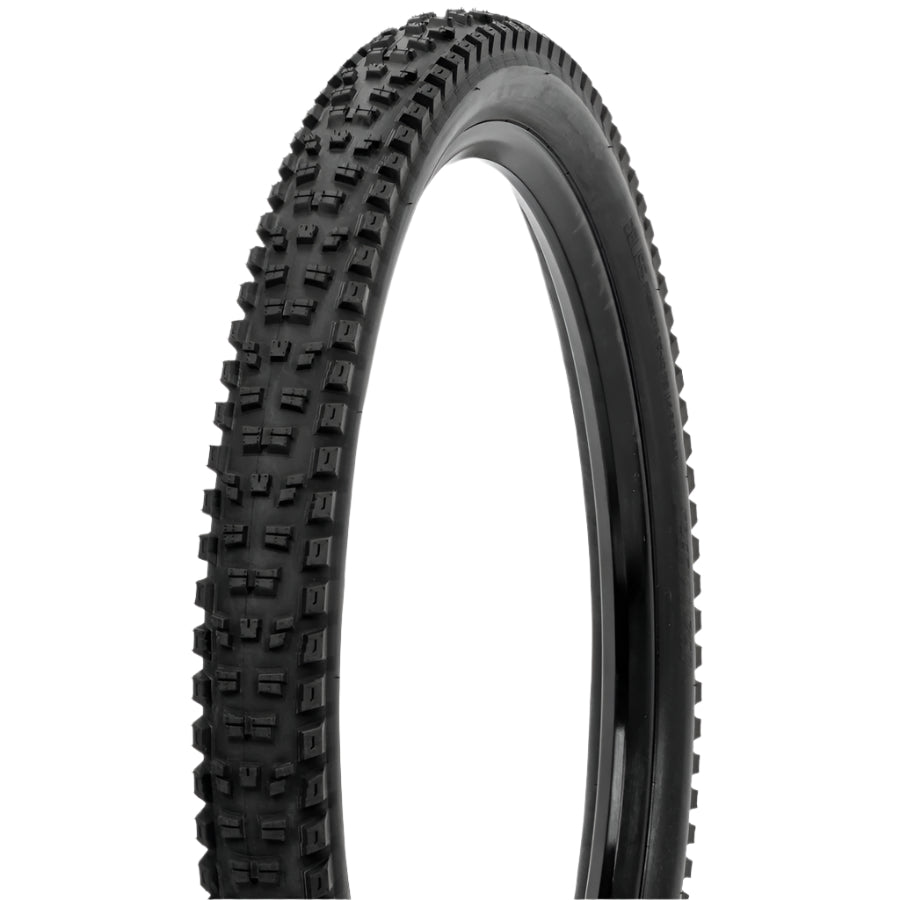 Black off-road tire with tread pattern on a white background