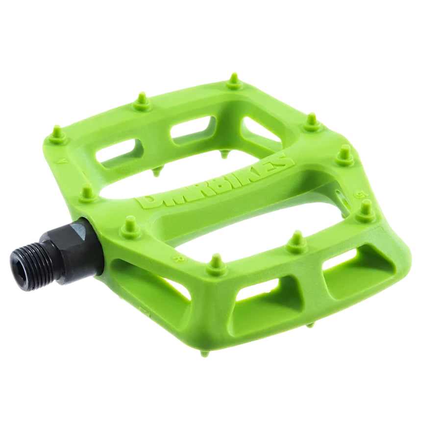 Green DMR bicycle pedal with 'Duel' branding on a white background
