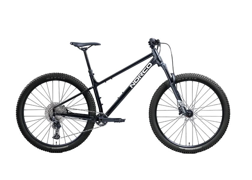 A black Norco full-suspension mountain bike with knobby tires and disc brakes, shown in a side profile against a light gray studio background.