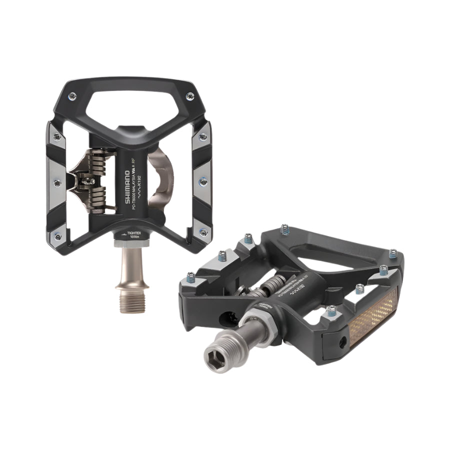 PD-T8000 DEORE XT SPD PEDAL W/ REFLECTOR, W/CLEAT(SM-SH56) Pair of black bicycle pedals on a white background