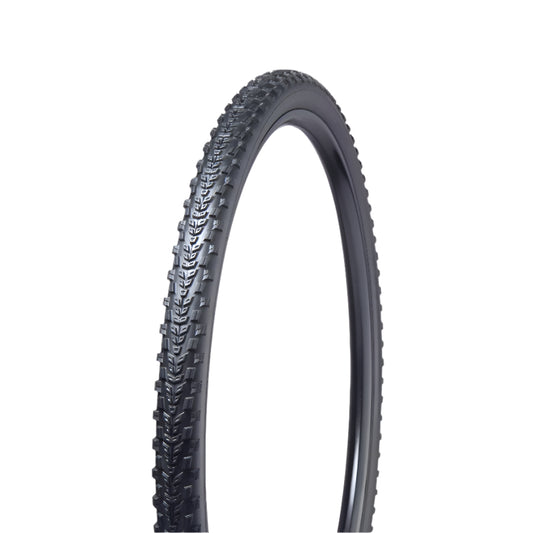 Black bicycle tire with tread pattern on a light gray background
