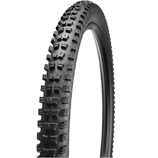 Bicycle tire with knobby tread pattern on a white background