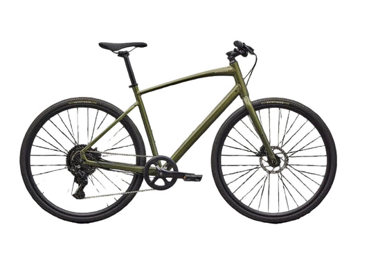 Green bicycle on a black background