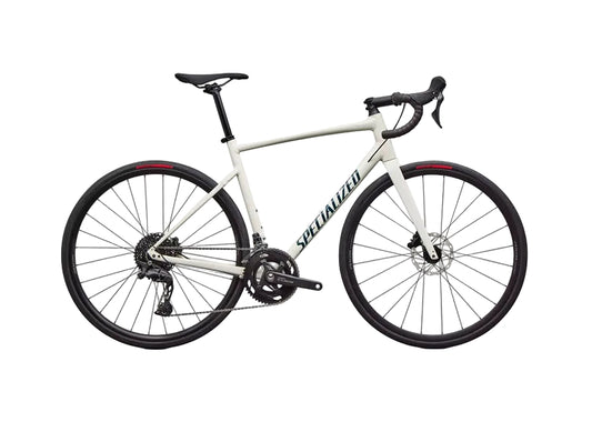 White bicycle with black components on a white background