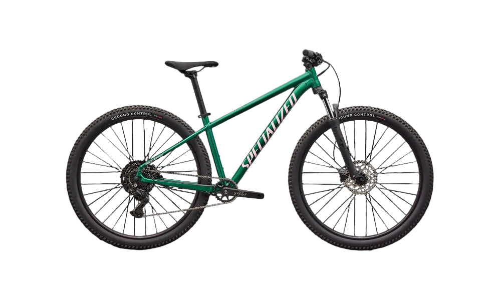 Green Specialized mountain bike on a black background