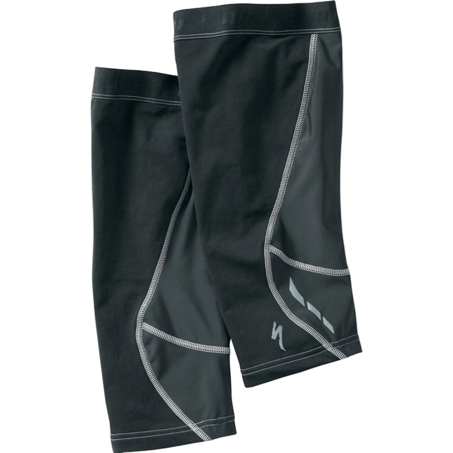 Black athletic shorts with white accents on a white background