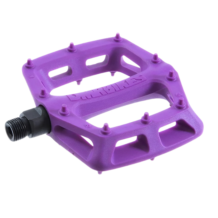Purple DMR bicycle pedal with 'Duel' branding on a white background
