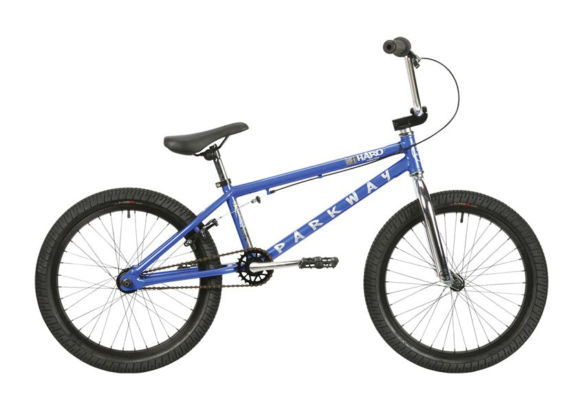 Blue bicycle with black wheels on a white background