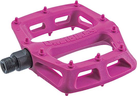 Pink bicycle pedal with a black axle on a white background
